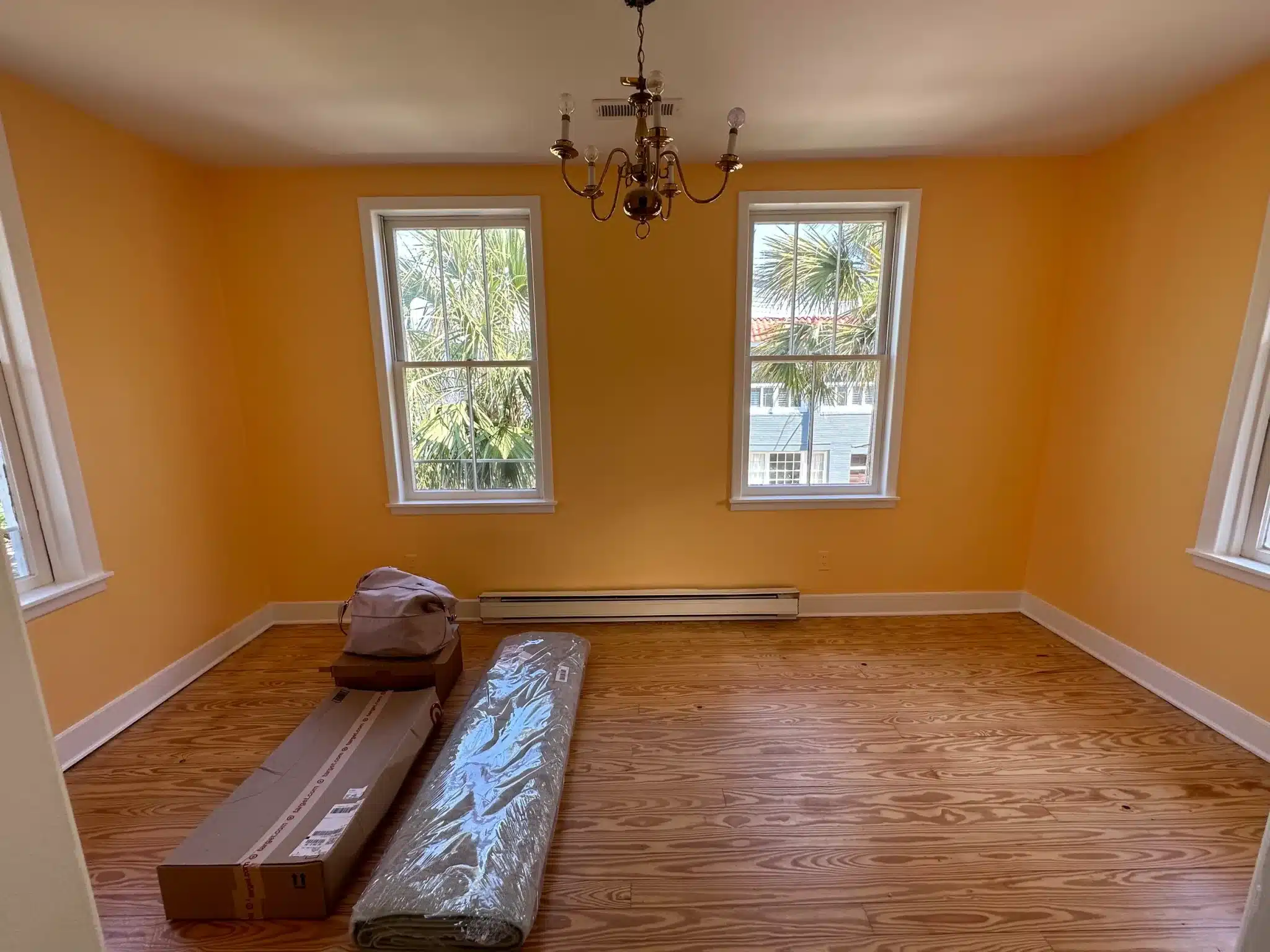 Orange room isle of palms interior painting historic by Wade Paint Co