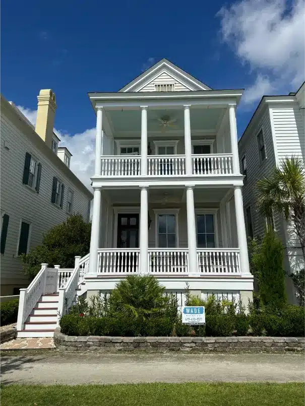 Classic White Double-Decker Porch House painted by Wade Paint Co