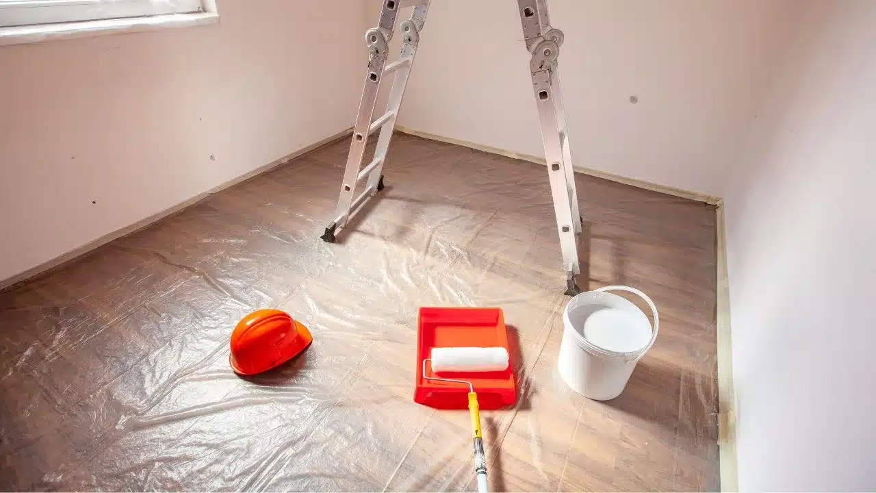 protective sheets on floor in preparation of painting
