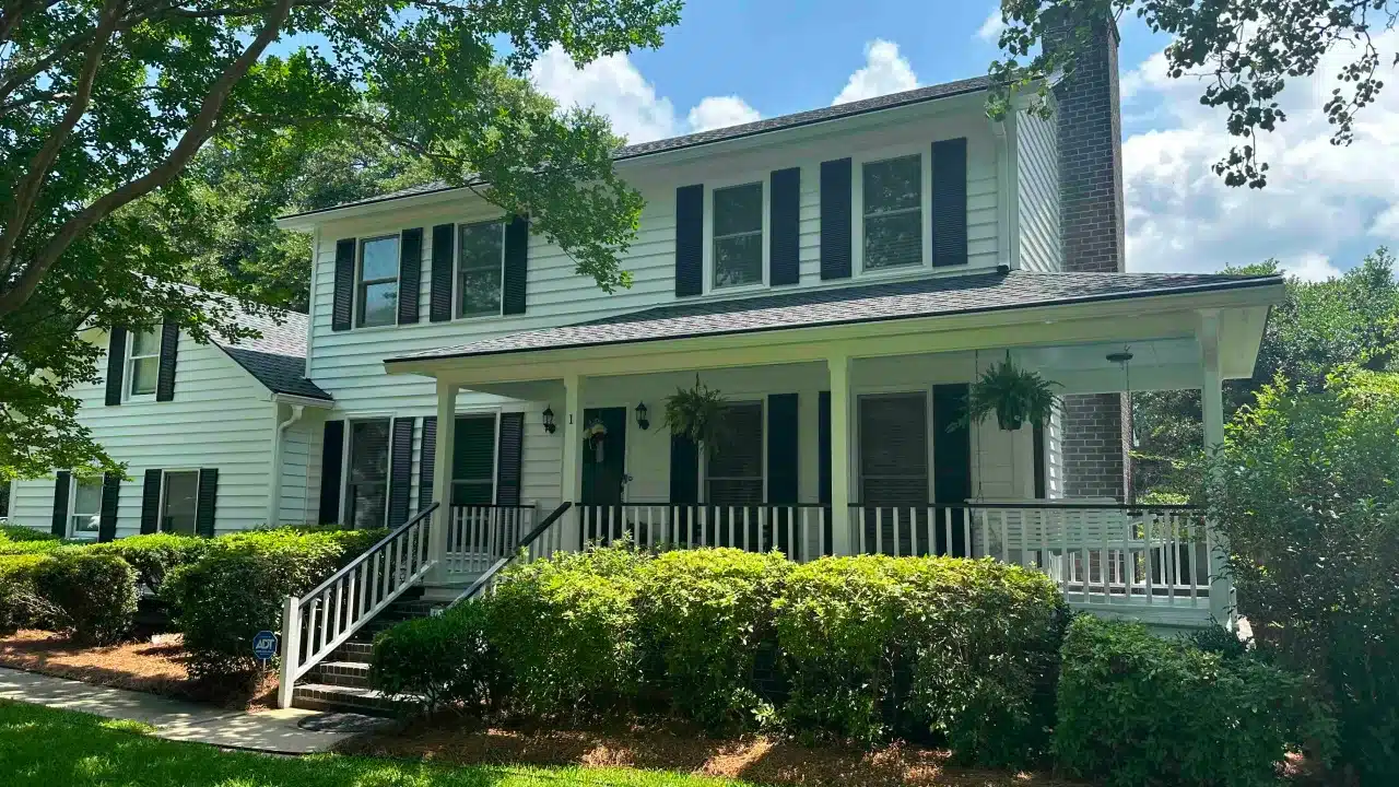 white exterior paint job with masonry chimney wade paint co